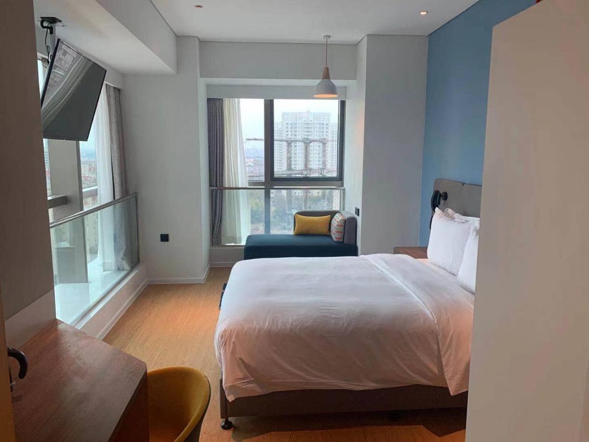 Holiday Inn Express Shanghai Baoyang By Ihg Buitenkant foto